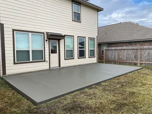 Concrete patio at the backyard of a house.
