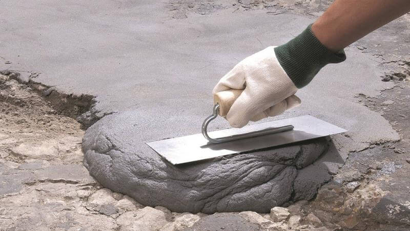 Concrete contractor working with concrete